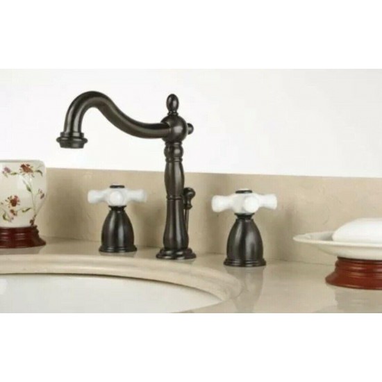 Kingston Brass KB1975PX Heritage Widespread Lavatory Faucet With Porcelain Cross Handle Oil Rubbed Bronze